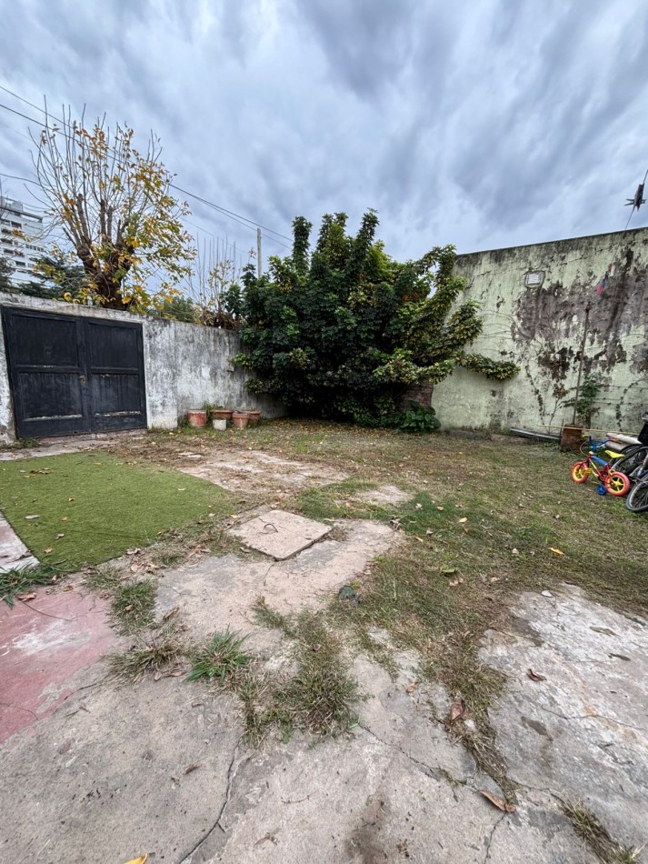 CASA CON LOTE EN MUÑIZ