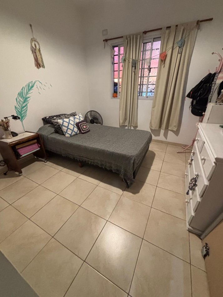 DOS AMBIENTES CON COCHERA EN PLANTA ALTA EN VENTA 